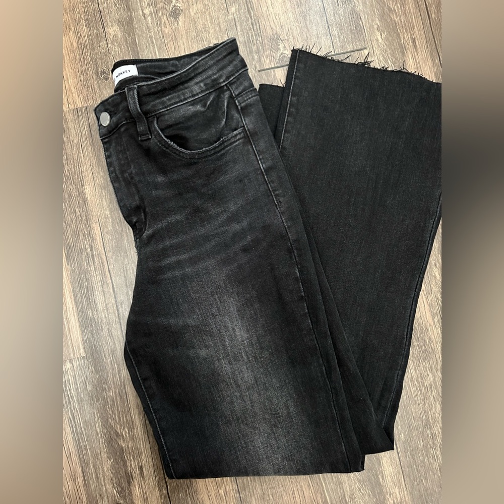 Women’s black straight leg flying money jeans